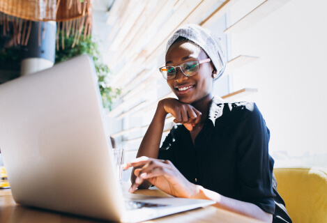 A lady working on a laptop