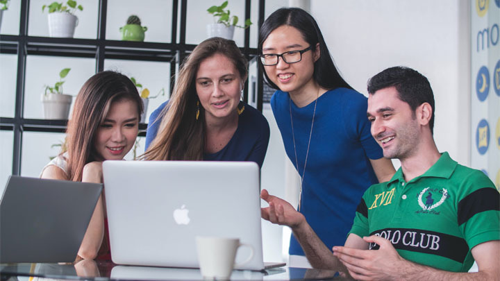 group of people with laptop