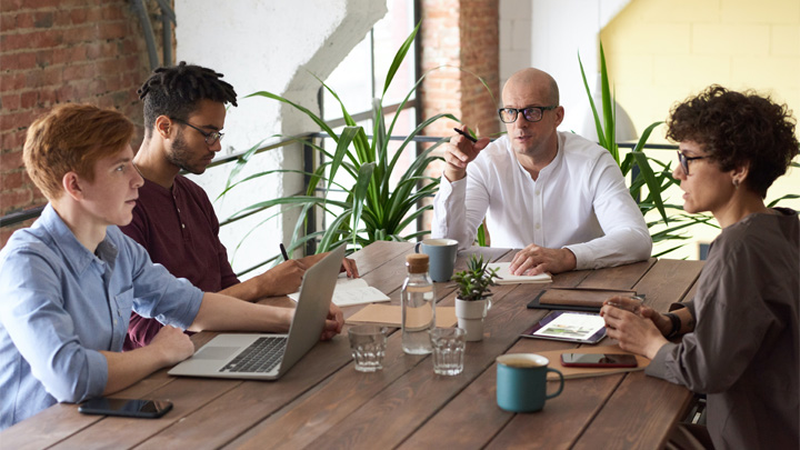 People working around a table