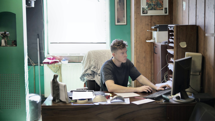 Man working at desk at home